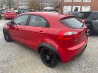 Gebraucht Kia Rio Edition 7 109 PS (80 kW) 2013 (beg) signal red (bordeaux) (metallic) Limousine