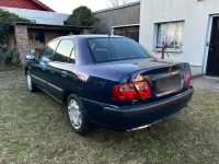 Gebraucht Mitsubishi Carisma 125 PS (91 kW) 1999 Blau Limousine