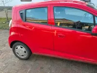 Używany Chevrolet Spark 60 KM (44 kW) 2011 Czerwony Hatchback