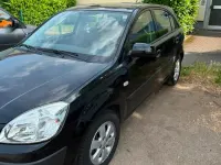 Gebraucht Kia Rio 96 PS (70 kW) 2009 Schwarz Kleinwagen