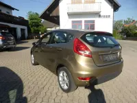 Gebraucht Ford Fiesta Titanium 97 PS (71 kW) 2012 Castanobraun metallic Kleinwagen