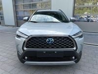 Gebraucht Toyota Corolla Cross Comfort 197 PS (144 kW) 2024 Shimmering silver met. 1l0 SUV