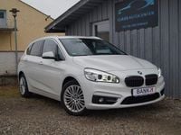 Gebraucht BMW 218 Active Tourer Luxury Line 150 PS (110 kW) 2014 Weiß Van / Kleinbus