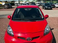 Gebraucht Toyota Aygo 68 PS (50 kW) 2009 Rot Kleinwagen