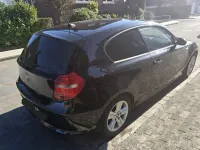 Gebraucht BMW 116 120 PS (88 kW) 2008 Schwarz Kleinwagen