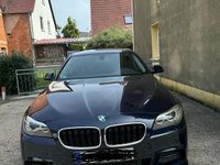 Second-hand BMW 520 190 CP (139 kW) 2014 Albastru Berlinǎ