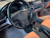 Używany Kia Picanto EX 65 KM (47 kW) 2004 Pomarańczowy Hatchback