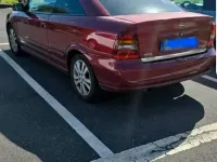 Second-hand Opel Astra 125 CP (91 kW) 2001 Roșu Coupe