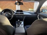Second-hand BMW 318 143 CP (105 kW) 2014 Negru Break