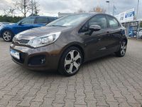Gebraucht Kia Rio 109 PS (80 kW) 2013 Braun Limousine
