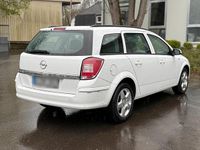 Second-hand Opel Astra 110 CP (80 kW) 2009 Alb Break