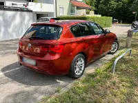 Gebraucht BMW 118 Sport Line 136 PS (100 kW) 2019 Orange Limousine
