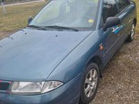 Gebraucht Mitsubishi Carisma 90 PS (66 kW) 1997 Blau Limousine