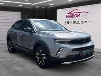 Gebraucht Opel Mokka-e Elegance 100 kW (136 PS) 2021 Kontrast grau/quarz silber SUV