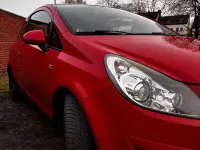 Usado Opel Corsa Innovation 80 HP (58 kW) 2009 Vermelho Citadino