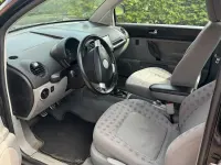 Gebraucht VW New Beetle 115 PS (84 kW) 1999 Schwarz Kleinwagen