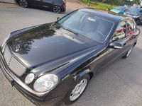 Second-hand Mercedes E200 122 CP (89 kW) 2006 Negru Berlinǎ