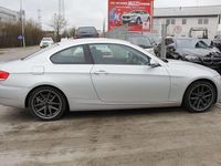 Gebraucht BMW 320 177 PS (130 kW) 2009 Titansilber metallic Coupé
