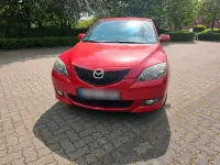 Używany Mazda 3 105 KM (77 kW) 2006 Czerwony Sedan/Limuzyna