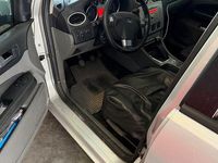 Second-hand Ford Focus Titanium 101 CP (74 kW) 2009 Argintiu Berlinǎ