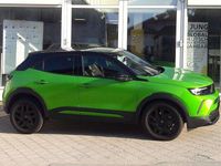 Gebraucht Opel Mokka-e GS Line 100 kW (136 PS) 2023 Matcha green/ikone gruen (metallic) SUV