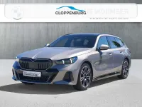 Gebraucht BMW 520 M Sport 197 PS (144 kW) 2024 Oxidgrau Kombi