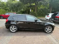 Gebraucht BMW 116 122 PS (89 kW) 2010 Schwarz Kleinwagen