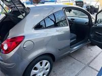 Używany Opel Corsa 85 KM (62 kW) 2010 Brązowy Hatchback