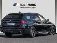 Gebraucht BMW 520 M Sport 190 PS (139 kW) 2023 M carbonschwarz metallic Kombi