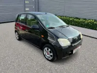 Gebraucht Daihatsu Cuore Plus 58 PS (42 kW) 2004 Schwarz Kleinwagen