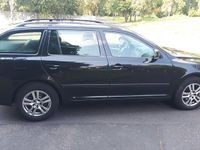 Second-hand Skoda Octavia Ambiente 122 CP (89 kW) 2011 Negru Break