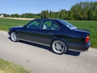 Używany BMW M5 326 KM (239 kW) 1995 Czarny Kombi