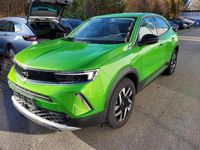 Gebraucht Opel Mokka-e Elegance 100 kW (136 PS) 2022 Matcha green/ikone gruen SUV