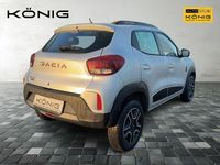 Gebraucht Dacia Spring Extreme 47 kW (65 PS) 2023 Diamantsilbergrau Kleinwagen