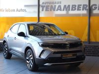 Gebraucht Opel Mokka-e Elegance 100 kW (136 PS) 2023 Kontrast grau/quarz silber SUV