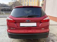 Gebraucht Ford Focus Titanium 125 PS (91 kW) 2014 Candyrot metallic Kombi
