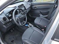 Gebraucht Dacia Spring Extreme 47 kW (65 PS) 2023 Diamantsilbergrau Kleinwagen