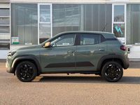 Gebraucht Dacia Spring Extreme 47 kW (65 PS) 2024 Oliv grün Kleinwagen