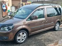 Używany VW Caddy Maxi 102 KM (75 kW) 2015 Brązowy Minivan