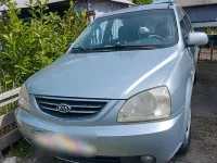 Gebraucht Kia Carens 138 PS (101 kW) 2005 Silber Van / Kleinbus