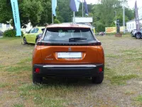Gebraucht Peugeot e-2008 Active 100 kW (136 PS) 2021 Orangefusion SUV
