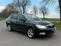 Usata Skoda Octavia 110 CV (80 kW) 2012 Nero Station wagon