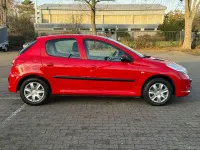 Gebraucht Peugeot 206+ Basis 73 PS (53 kW) 2010 Rot Kleinwagen