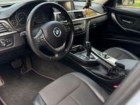 Gebraucht BMW 330 258 PS (189 kW) 2014 Silber Kombi