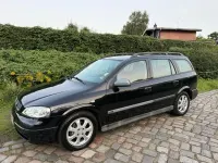 Używany Opel Astra Njoy 101 KM (74 kW) 2003 Czarny Sedan/Limuzyna