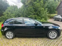 Gebraucht BMW 116 122 PS (89 kW) 2011 Schwarz Kleinwagen