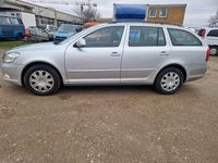 Gebraucht Skoda Octavia Ambiente 122 PS (89 kW) 2011 Brilliantsilber metallic Kombi