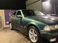 Gebraucht BMW 316 Basis 102 PS (75 kW) 1997 Grün Limousine