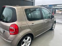 Second-hand Renault Modus 112 CP (82 kW) 2008 Auriu Monovolum