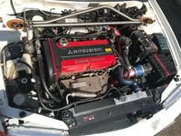 Second-hand Mitsubishi Lancer 280 CP (205 kW) 2000 Alb Berlinǎ